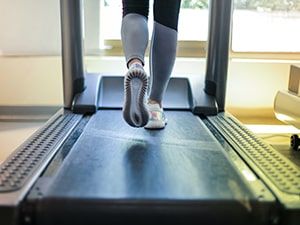 Jogging on the treadmill in your Winchester apartment fitness center
